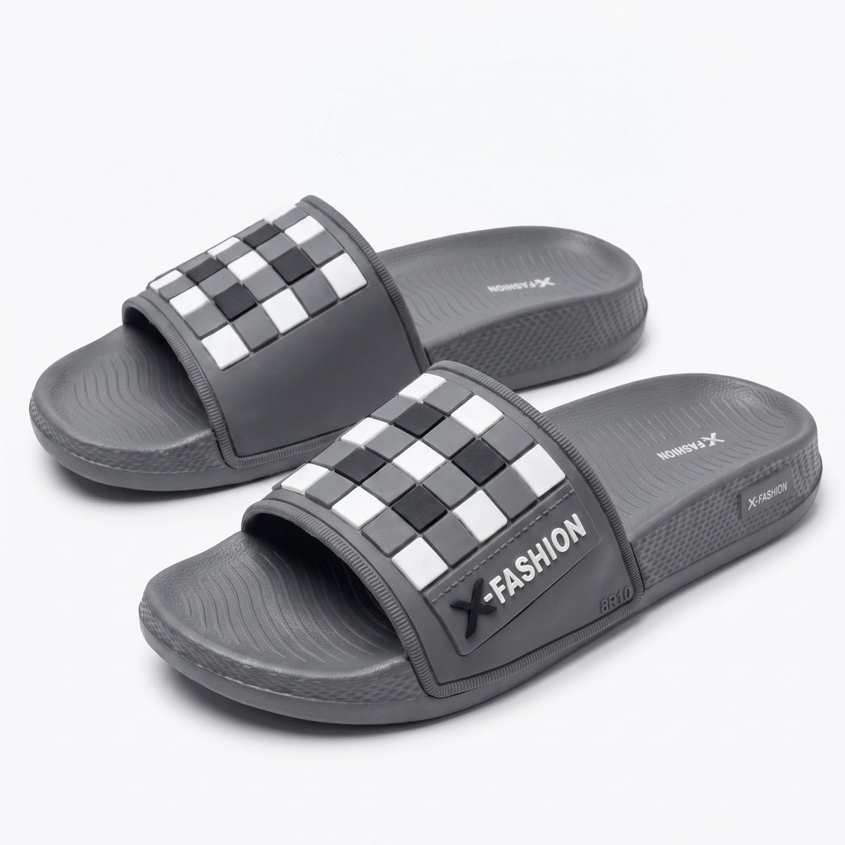 Angled top view of mens black and white check pattern slides
