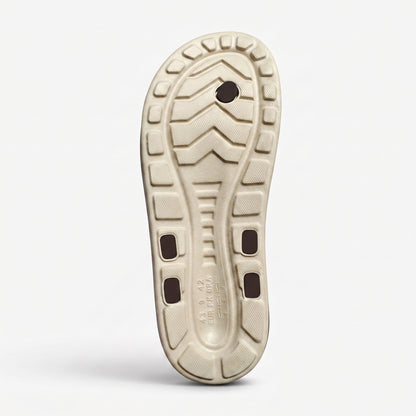 Textured anti slip bottom tread of mens outdoor flip flop sandals