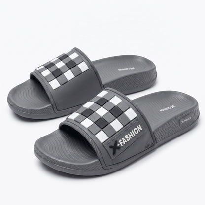 Angled top view of mens black and white check pattern slides