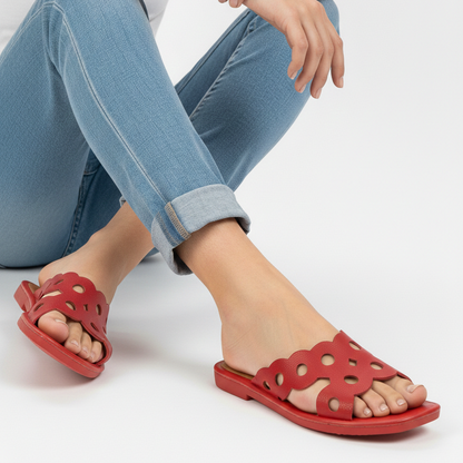 Red cushioned flat sole open back slide slippers close-up view