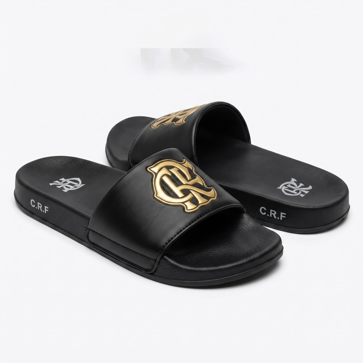 Front angle shot of mens casual black and gold slide slippers