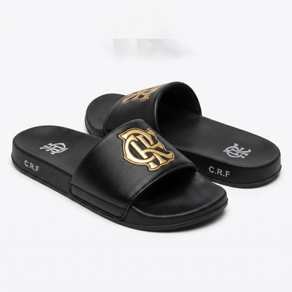 Front angle shot of mens casual black and gold slide slippers