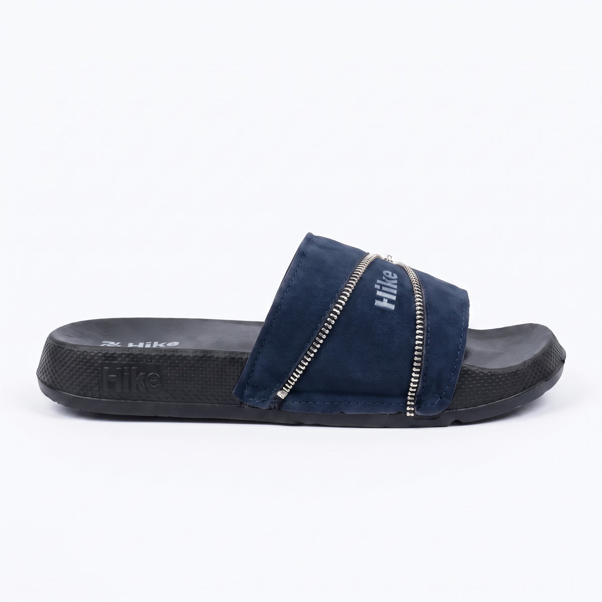 Flat side profile showing black cushioned sole on navy blue slides