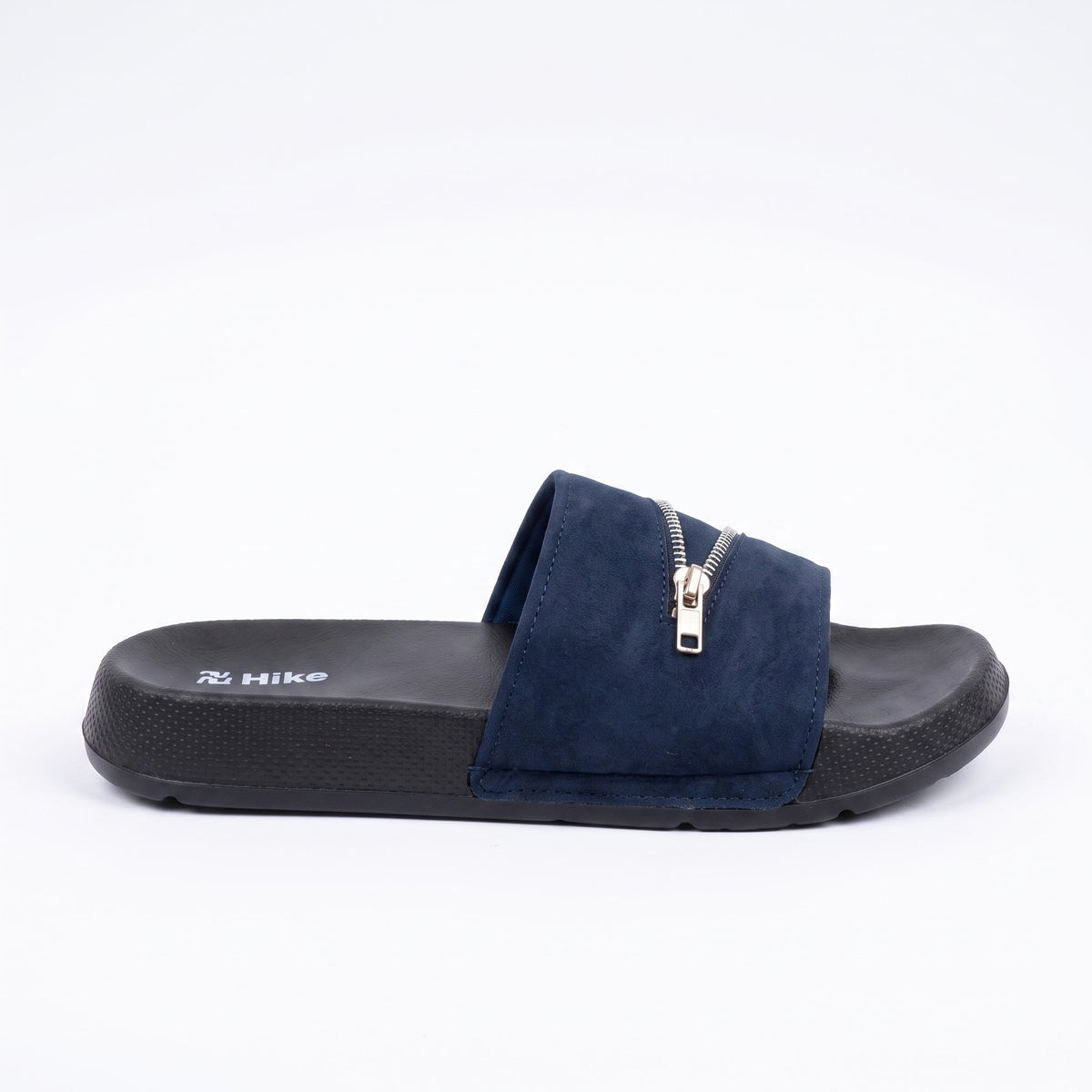 Low angle side view of navy blue zipper slide sandals