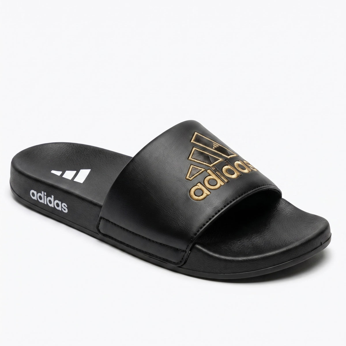 Angled view of mens black sports slide sandals showing gold logo
