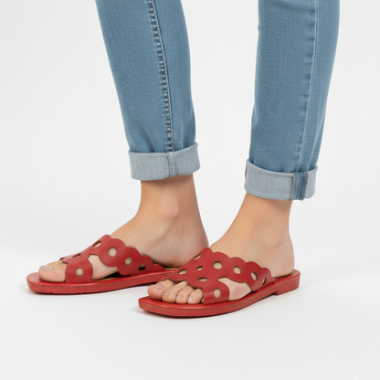 Red cushioned flat sole open back slide slippers left side view