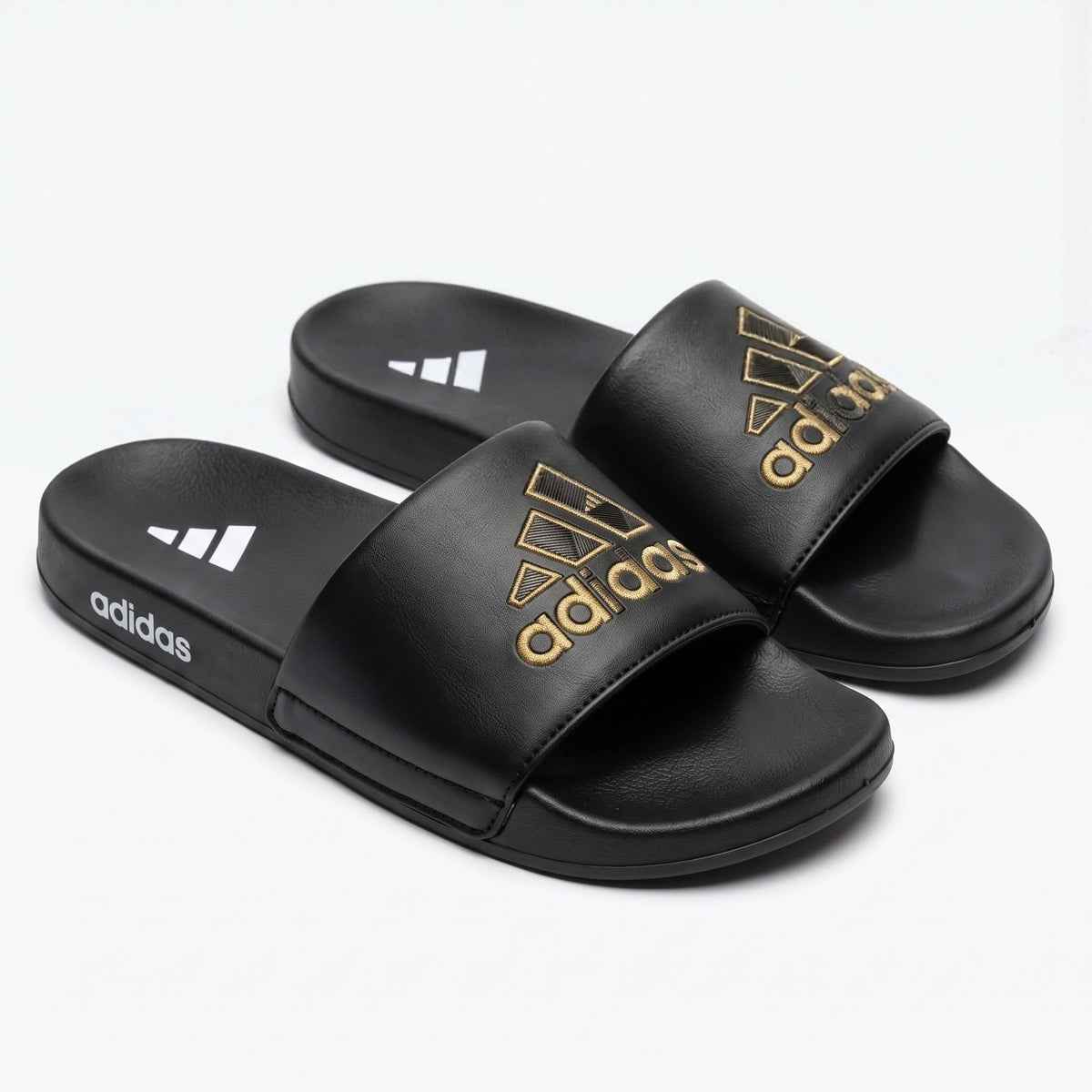 Mens black and gold sports slides pair view with soft comfort sole